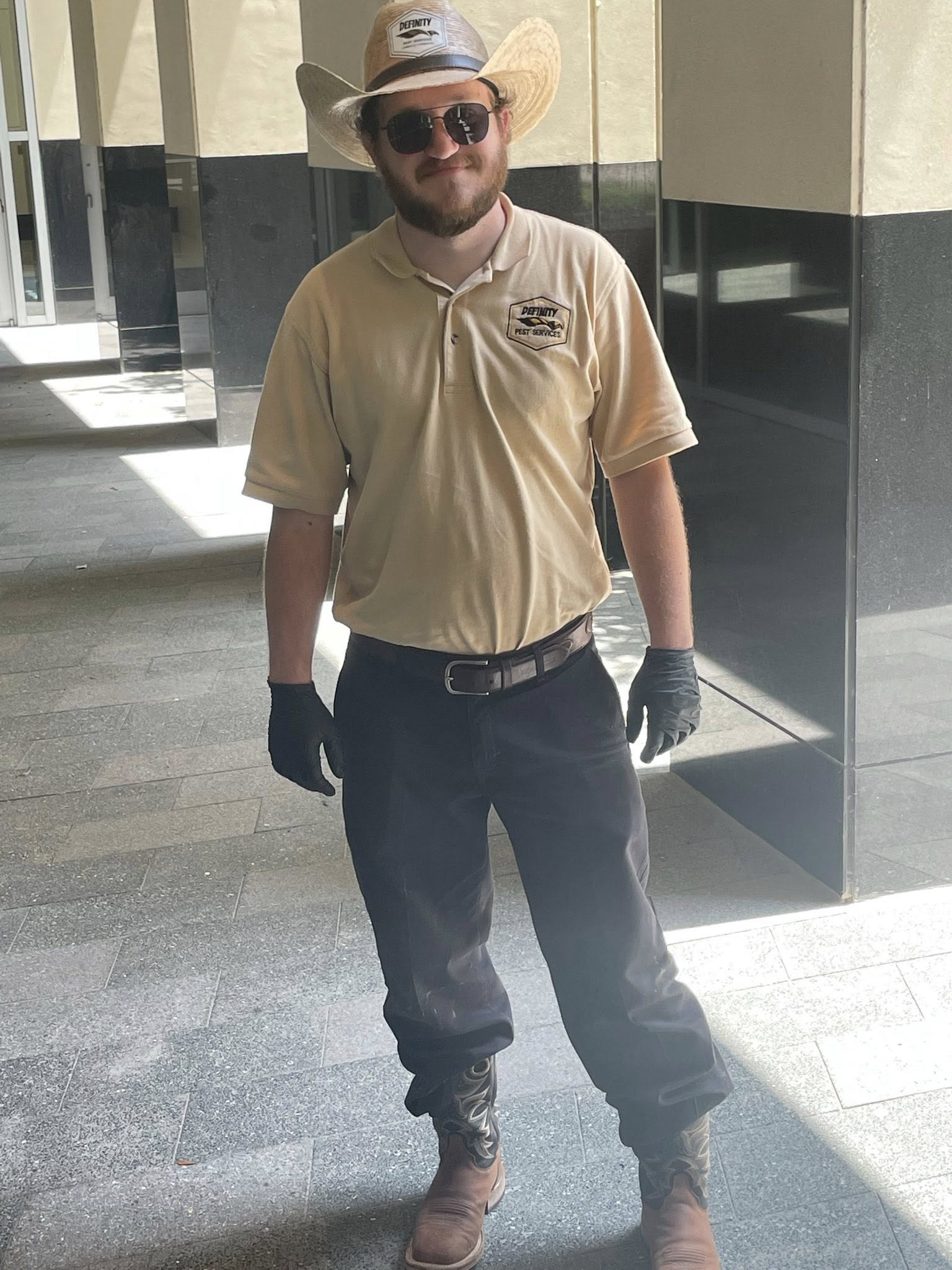 Employee in cowboy hat