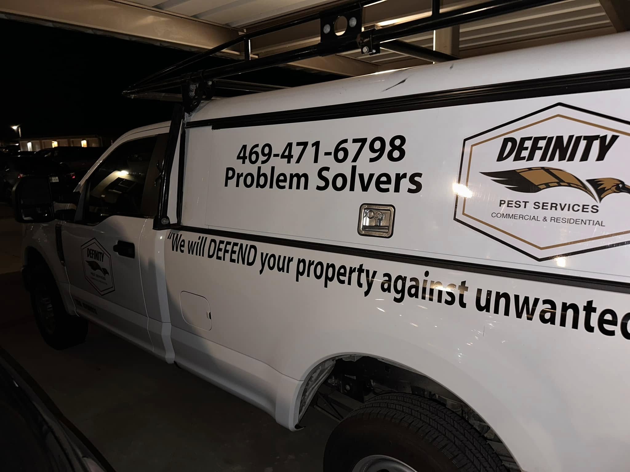 Definity Pest Services work truck — eagle-branded fleet