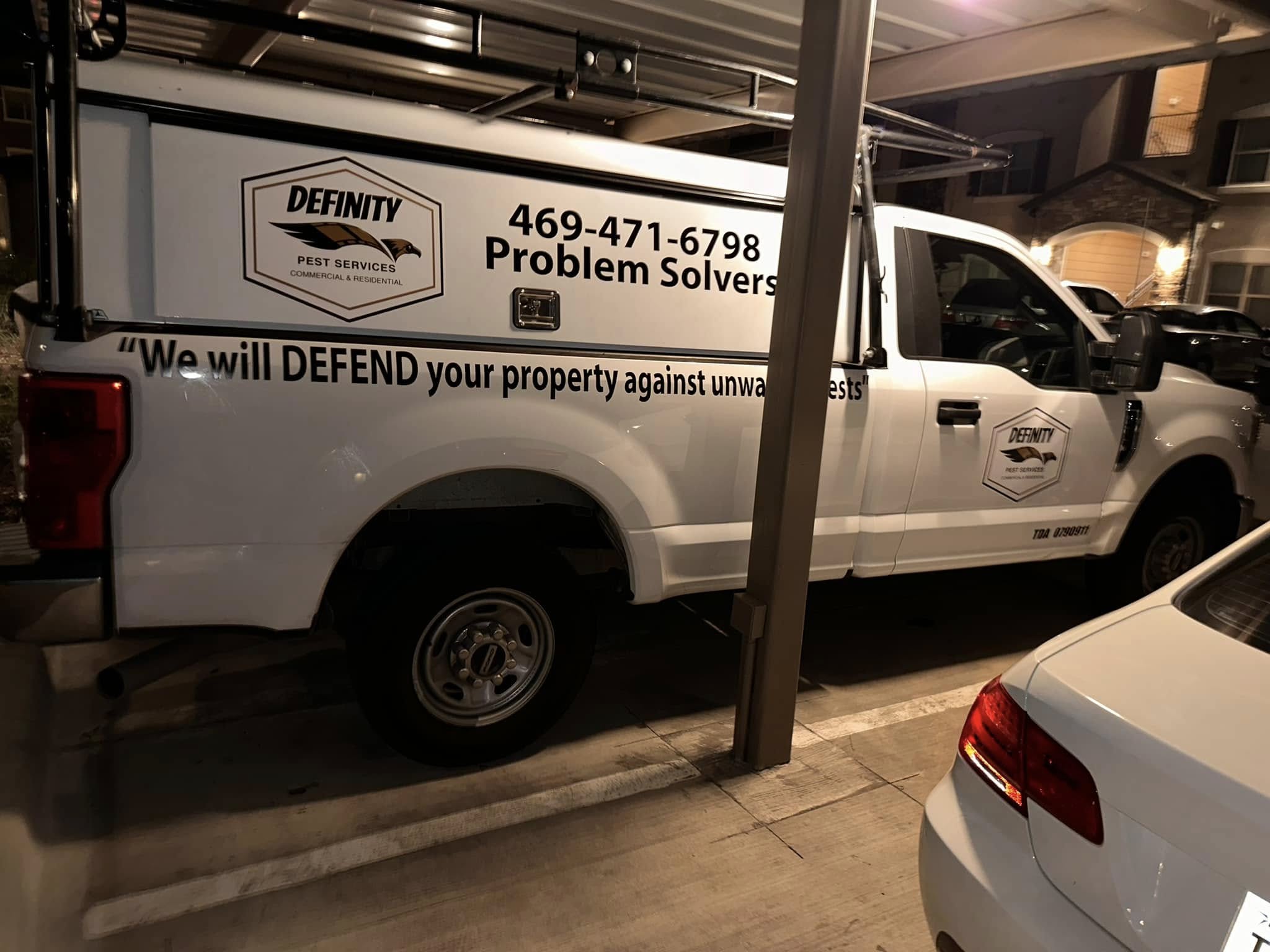 Definity Pest Services work truck — eagle-branded fleet